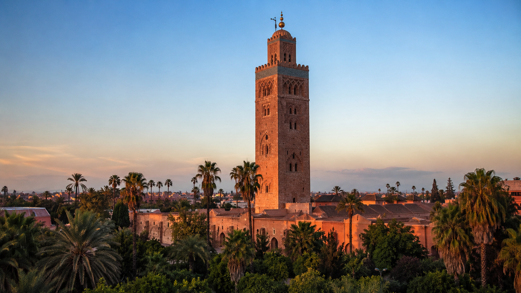 Luxury concierge service in Marrakech at golden hour with the Koutoubia minaret